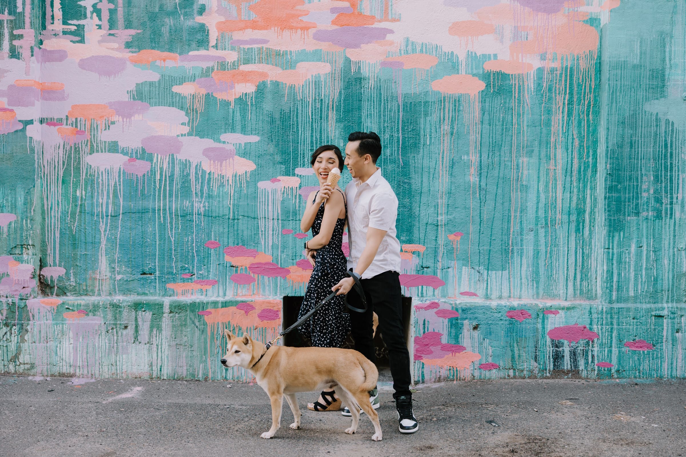 Alyssa and Oliver walking through the streets of Little Tokyo for their urban Los Angeles engagement session