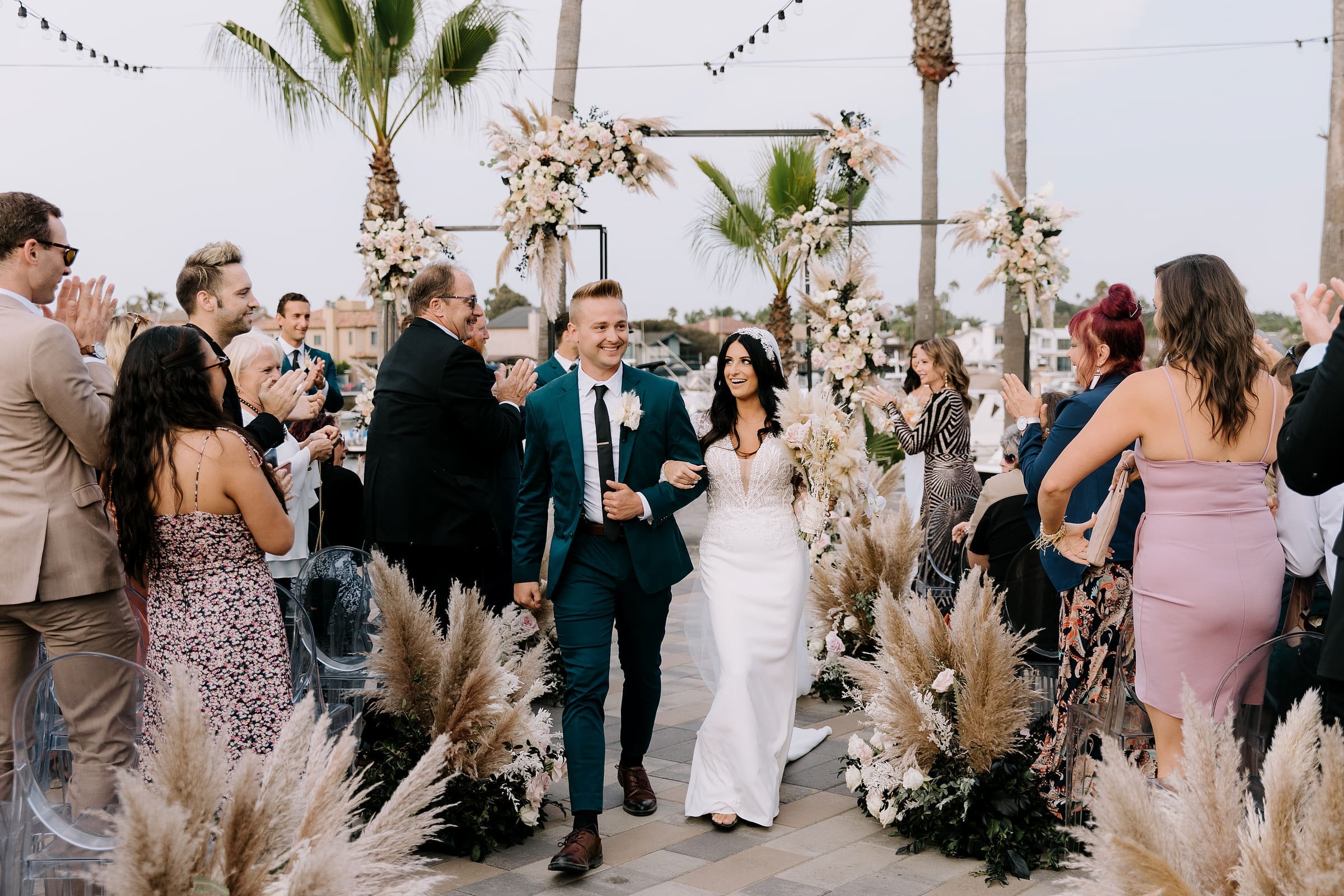 Bruce and Emily’s elegant and unique coastal wedding portraits in Huntington Beach.