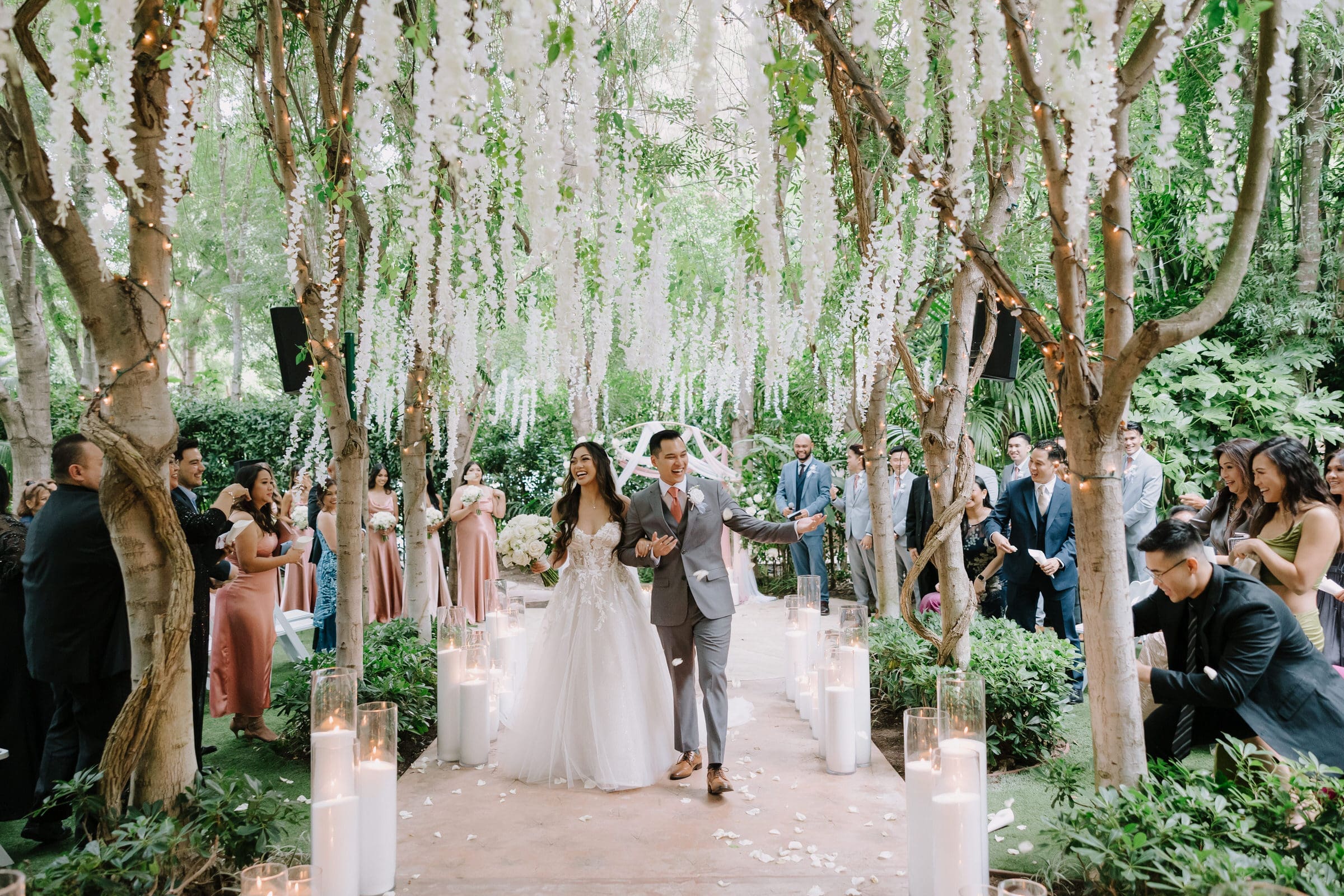 A romantic wedding portrait of Caitlinn and Kevin surrounded by tropical greenery at Hartley Botanica.